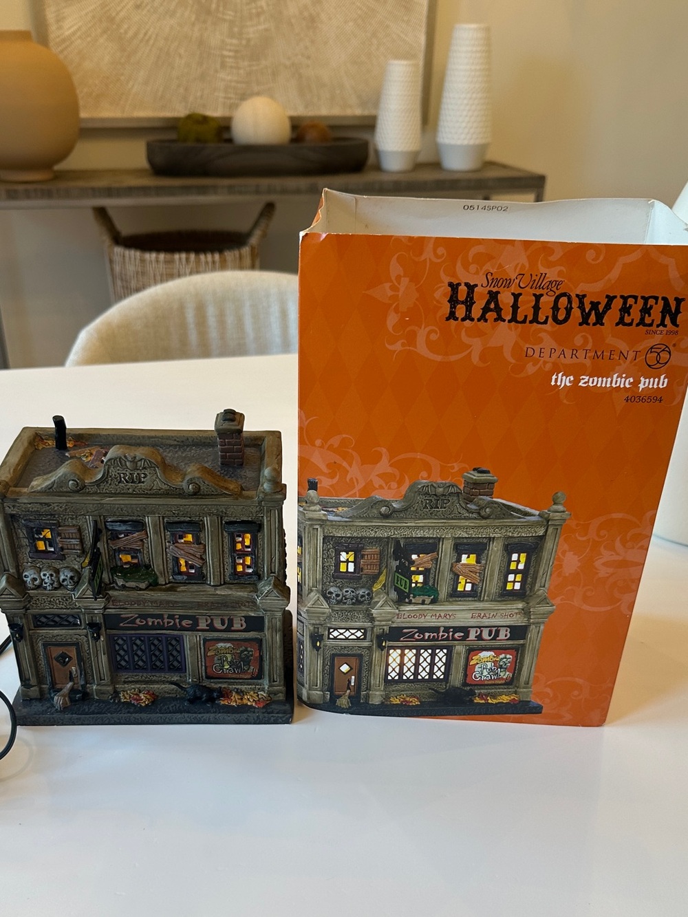 Department 56 Halloween Zombie Pub in Orange and Gray